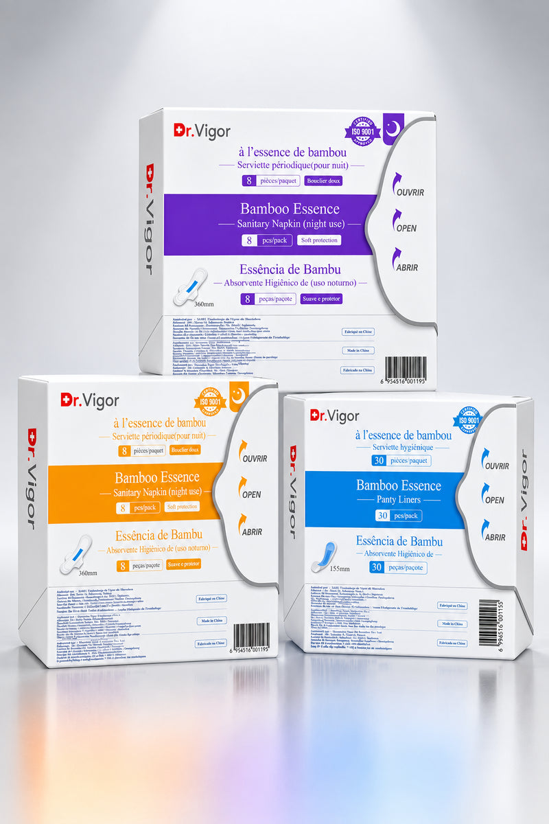 Three Dr.Vigor Bamboo Essence sanitary napkin boxes in different colors (white with purple, white with orange, and white with blue) arranged on a light gray reflective surface.